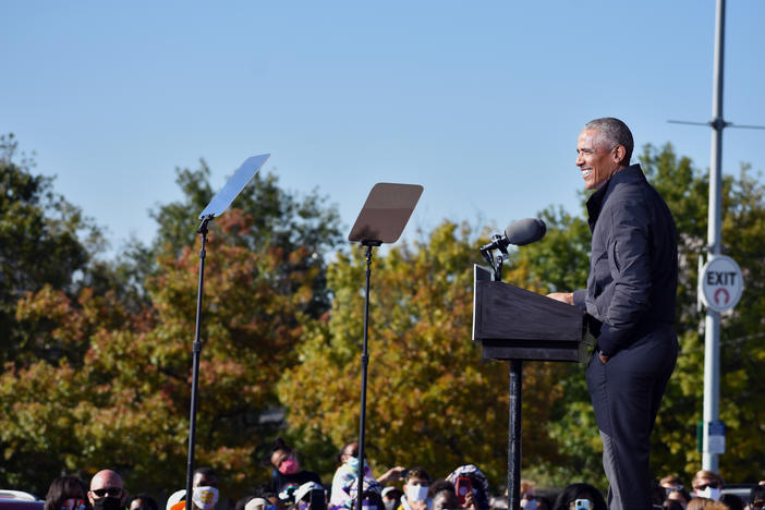 Former President Barack Obama campaigns in Atlanta less than 24 hours before polls open in Georgia.