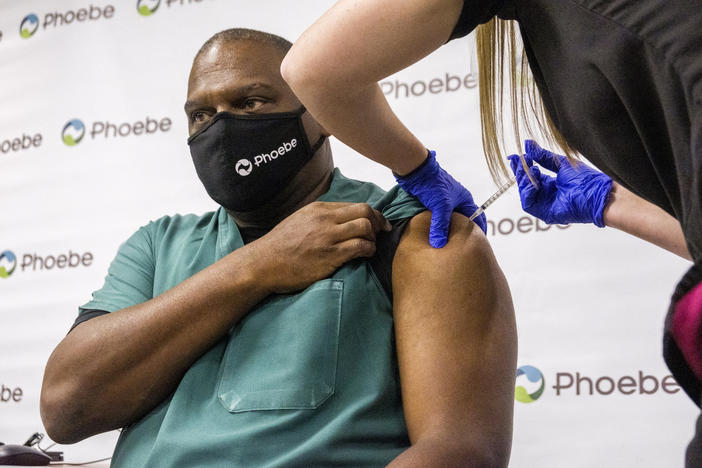Dr. James Black, head of emergency medicine at Phoebe Putney Memorial Hospital in Albany,   Ga, was the first to receive the COVID-19 vaccine Thursday in the city that was once among the most severely affected pandemic hotspots in the world.