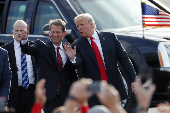In this Nov. 4, 2018, file photo, then-Georgia Republican gubernatorial candidate Brian Kemp, left, walks with President Donald Trump as Trump arrives for a rally in Macon , Ga. President Trump said Sunday, Nov. 29, 2020 he was “ashamed” for endorsing the Republican governor of Georgia after he lost in the state to Democrat Joe Biden. 