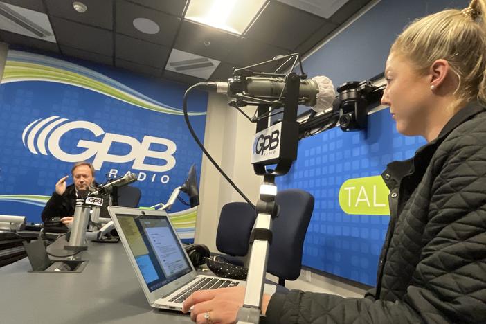 Hosts Jon Nelson and Hannah Goodin during a taping of the "Football Fridays in Georgia" podcast.