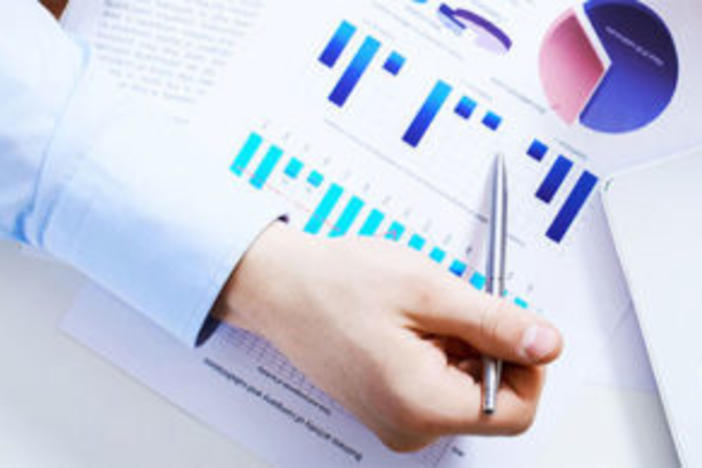 Person pointing to chart