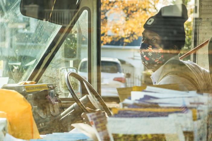 Tony King is among the postal carriers and delivery workers who have racked up untold over time during this holiday season. 