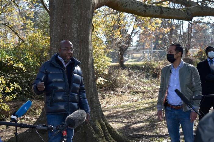 Rev. Raphael Warnock campaigning with Julian Castro