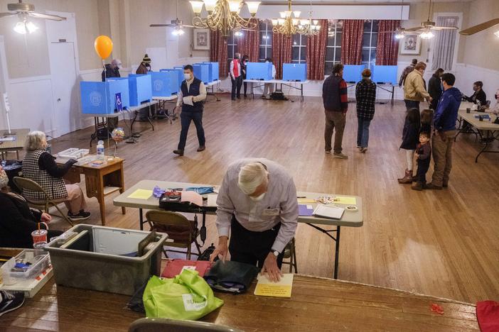 Voters cast their ballots in a precinct in the norther suburbs of Macon in January 5th's runoff election.