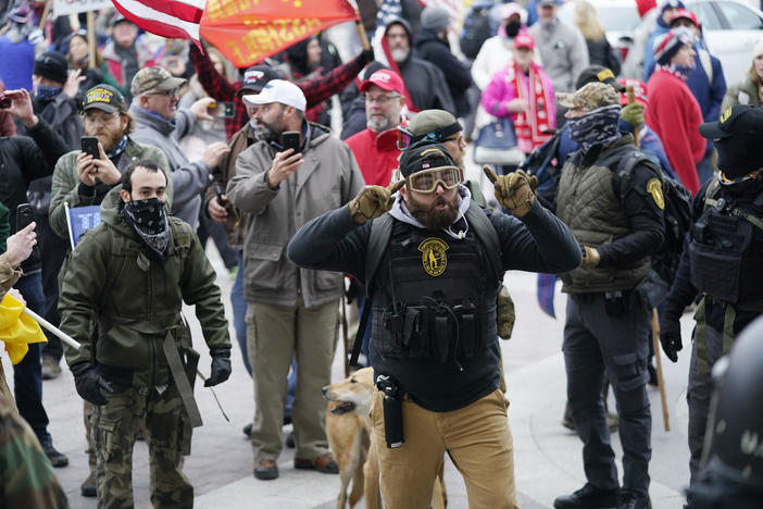 In this Jan. 6, 2021, file photo, Trump supporters gather outside the Capitol in Washington. As rioters converged on the U.S. Capitol building, the grounds normally hailed as the seat of American democracy became a melting pot of extremist groups. Militia members, white supremacists, paramilitary organizations and fervent supporters of outgoing President Donald Trump stood shoulder to shoulder, unified in rage.