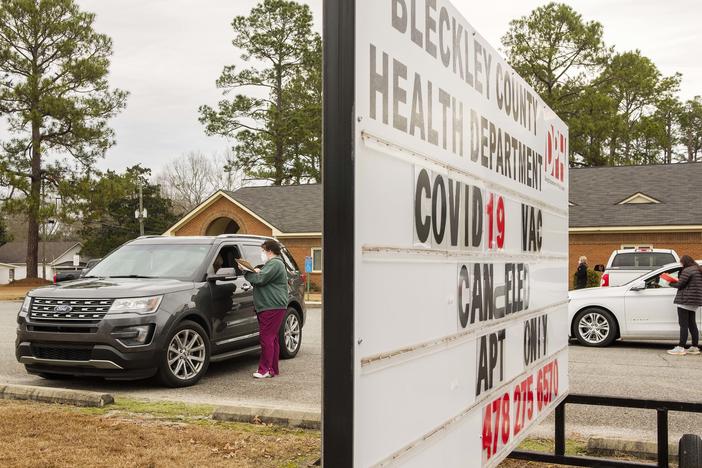 Health workers schedule vaccination appointments for people who came to the Bleckley County Health Department expecting a no appointment vaccine Monday morning. 
