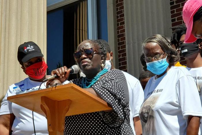 Kimberly Arbery, Ahmaud Arbery's aunt, was overcome with emotion addressing the crowd at a rally Friday.