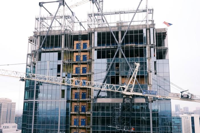 Multiple buildings evacuated in Midtown Atlanta as giant tower crane at construction site leans on Friday, Feb. 19, 2021.