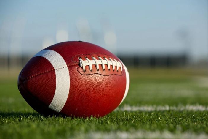 Photo of football in field