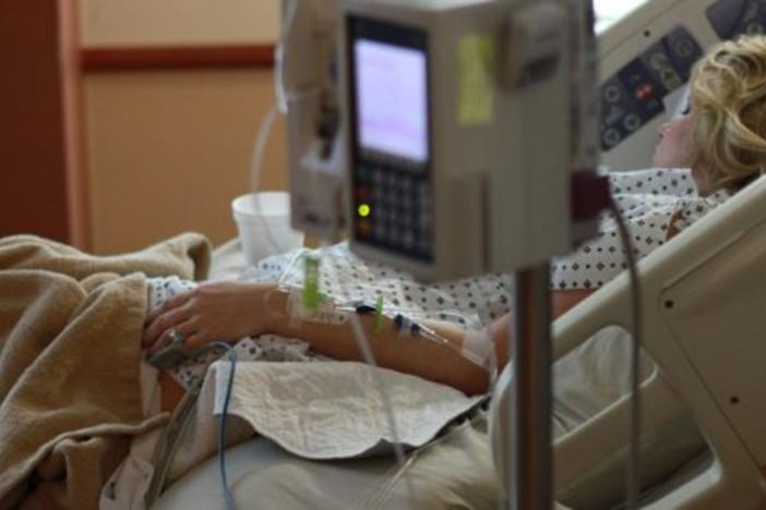 Patient in hospital bed