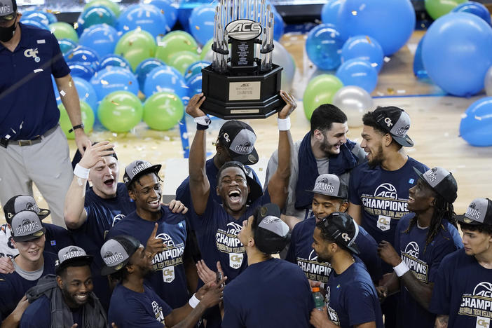 Georgia Tech's men's basketball team celebrates its ACC Tournament championship win Saturday, March 13, 2021 in Greensboro, NC.