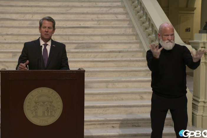 Gov. Brian Kemp and ASL interpreter David Cowan