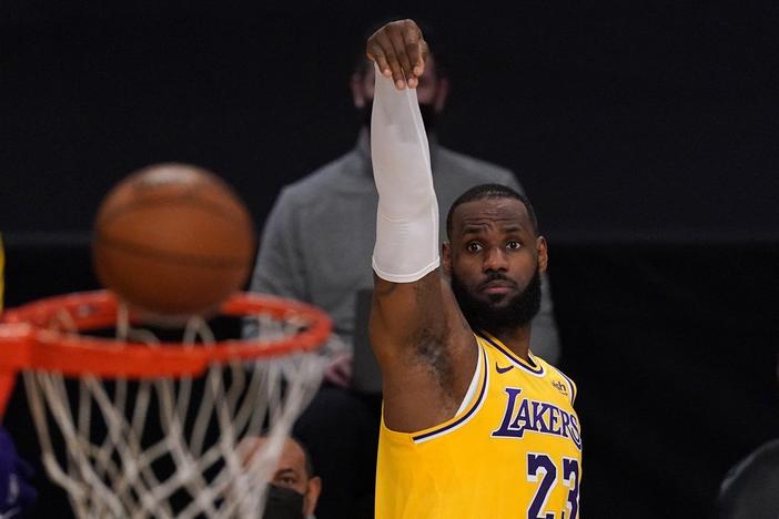 Los Angeles Lakers forward LeBron James shoots during the first half of an NBA basketball game against the Oklahoma City Thunder Monday, Feb. 8, 2021, in Los Angeles. 