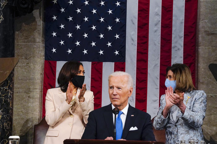 Vice President Kamala Harris and House Speaker Nancy Pelosi of Calif., look at each other as President Joe Biden addresses a joint session of Congress, Wednesday, April 28, 2021, in the House Chamber at the U.S. Capitol in Washington.