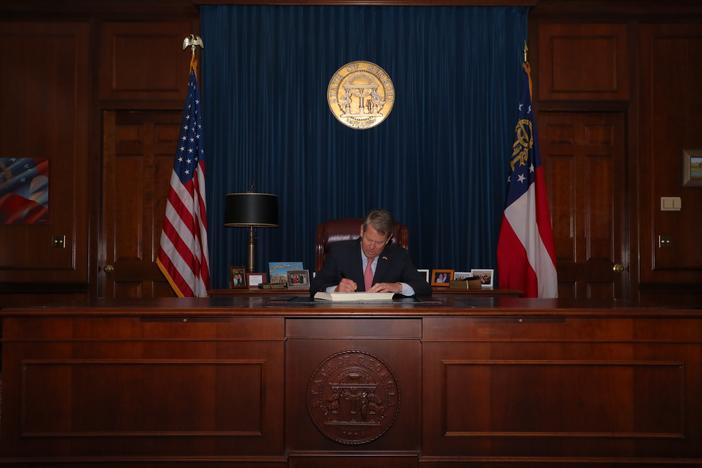 Gov. Kemp signs the FY 2022 budget in his office Monday, May 10, 2021.