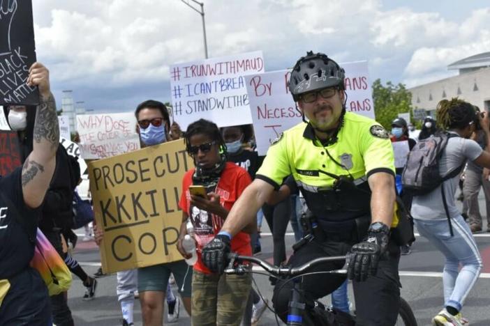 Police officer on bike at protest