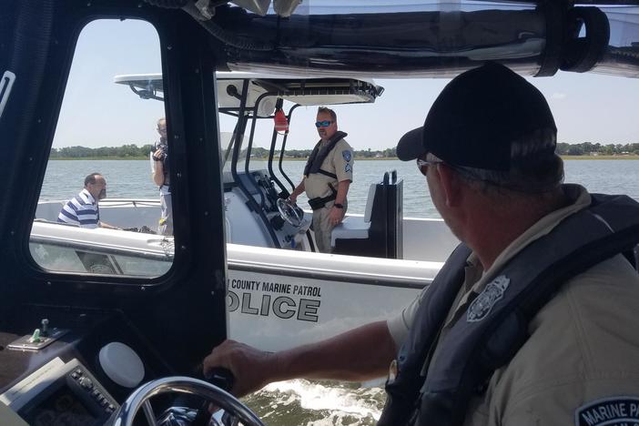 Chatham County Marine Patrol officers in two police boats