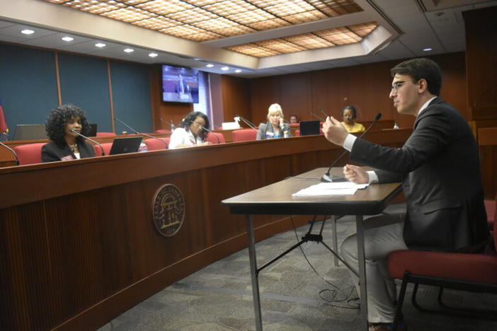 Breitbart reporter speaking to members of the Georgia Legislature