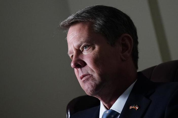 In this July 7, 2021, photo Georgia Gov. Brian Kemp speaks during an interview at his campaign office in Atlanta. 