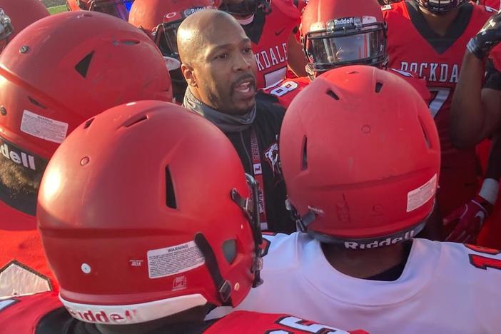 Rockdale County Head Coach Lee Hannah Surrounded By His Players