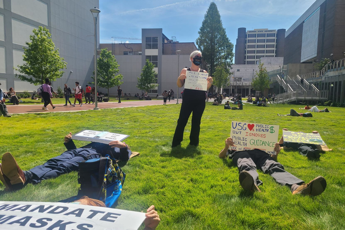 People gathered on a lawn at Georgia State University Thursday Sept. 9.