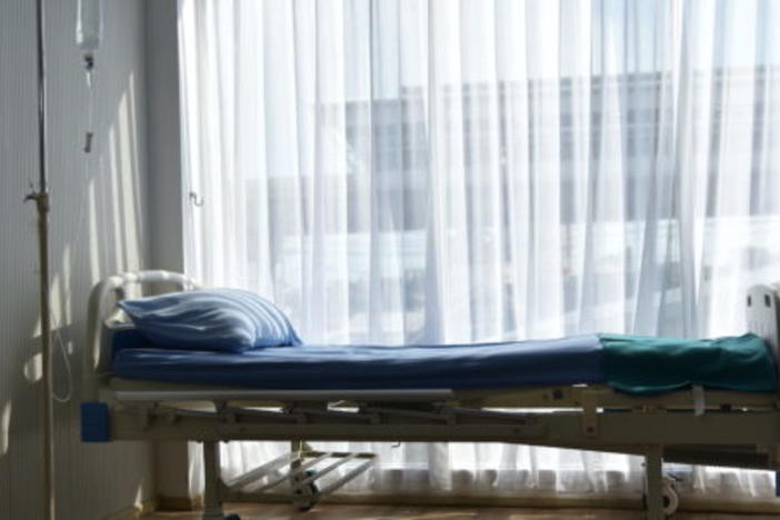 Empty hospital bed