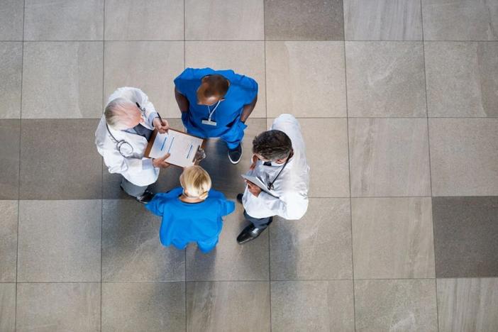 Doctors standing in circle