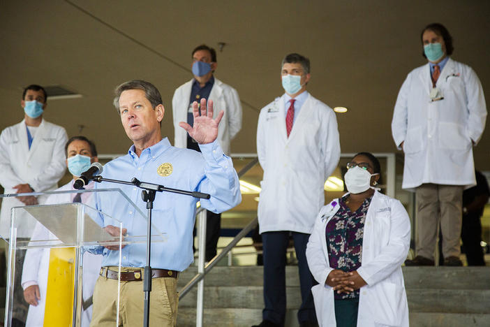 Gov. Brian Kemp with doctors from the Medical Center at Atrium Health in Macon in 2020. 