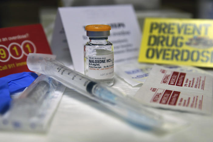 A kit with naloxone is displayed at the South Jersey AIDS Alliance in Atlantic City, N.J. on Wednesday, Feb. 19, 2014. An overdose of opiates essentially makes the body forget to breathe. Naloxone works by blocking the brain receptors that opiates latch onto and helping the body "remember" to take in air. 