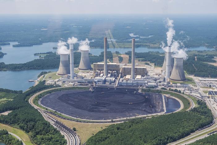 Georgia Power's Plant Scherer, fronted by the pile of coal being prepped to burn to make electricity, in 2019. 