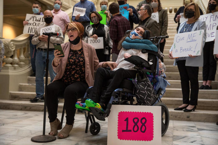 Callie Moore (right), who is 26 and lives in her own apartment in Athens, was one of 188 people in Georgia who would have been affected by a state proposal that has since been abandoned.