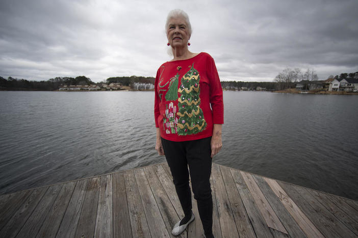 Wanda Olson poses for a photo in Villa Rica, Ga., on Dec. 17. When Olson's son-in-law died in March after contracting COVID-19, she and her daughter had to grapple with more than just their sudden grief. They had to come up with money for a cremation. Even without a funeral, the bill came to nearly $2,000, a hefty sum that Olson initially covered.
