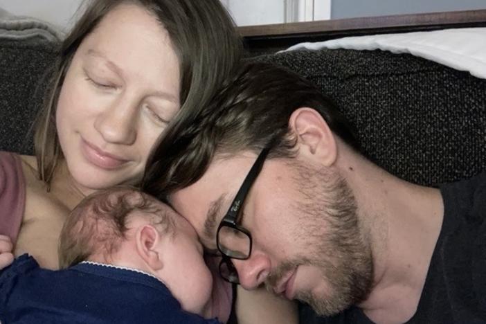 Isadora Pennington and Matt McDaniel hold their daughter Delilah McDaniel, born during the pandemic