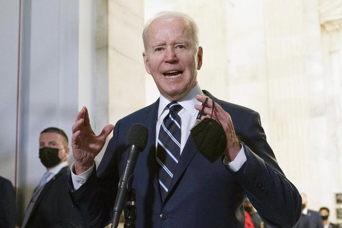 President Joe Biden speaks to the media after meeting privately with Senate Democrats, Thursday, Jan. 13, 2022, on Capitol Hill in Washington.