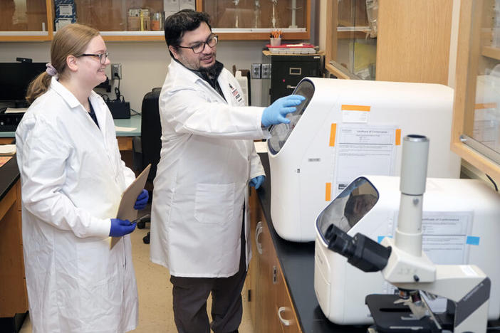 UGA researcher Issmat Kassem, pictured to the right of research professional Miranda Barr, has discovered a gene that causes bacteria to be resistant to antibiotics in Georgia sewer water.