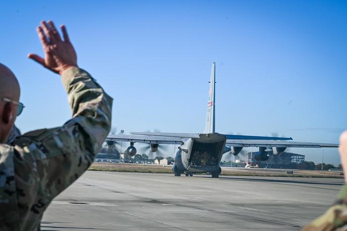 Waving to 165th Airlift Wing members deploying to Europe