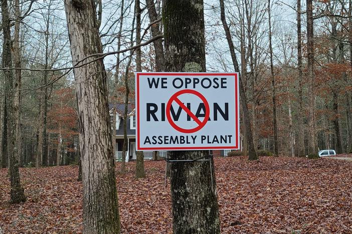 Residents in Morgan County and surrounding areas are hanging 'We oppose Rivian assembly plant' signs to express their 