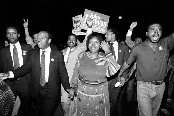 John Lewis, left, and his wife, Lillian, lead a march of supporters from his campaign headquarters to an Atlanta hotel for a victory party after he defeated Julian Bond in a run-off election for Georgia's Fifth Congressional District seat in Atlanta, Ga., Tuesday night, Sept. 3, 1986. A foundation named for U.S. Rep. John Lewis and his wife has been established to further the work of the late civil rights pioneer.