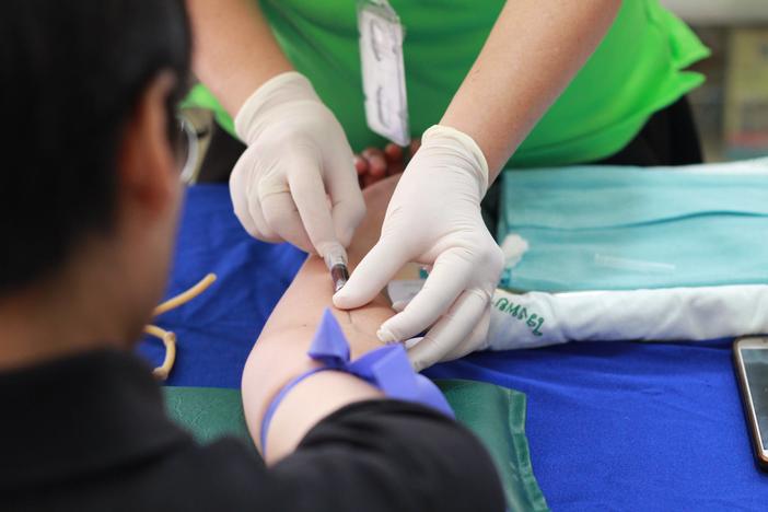 Person getting blood drawn