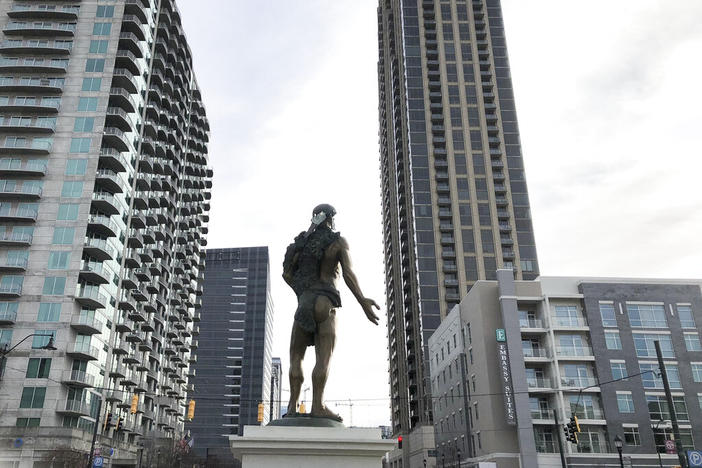 The back side of a statue depicting Chief Tomochichi, a Muscogee native who signed the 1733 Treaty of Savannah that launched the Georgia colony, pictured here on Dec. 20, 2021 in its temporary location in Atlanta. Muscogee Creek Nation historians say their ancestor would have been fully clothed, not clutching a bear pelt that doesn't cover his rear end.