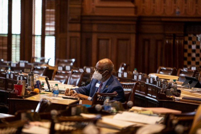 Rep. Calvin Smyre, D-Columbus, sits by himself on the state House floor during lunch, preparing his speech for the landmark hate crimes bill-signing in June 2020. Smyre co-sponsored the original legislation.