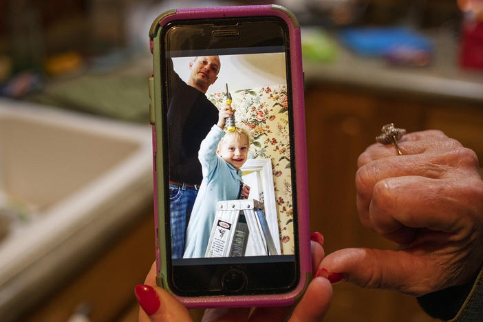 A photo of Joshua Lester, left, and his son Memphis, on Nancy Masters' phone. 