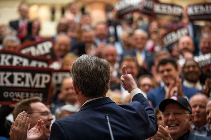 Gov. Brian Kemp gives the thumbs up to supporters as he officially submits paperwork at the state Capitol to run in the 2022 gubernatorial election.