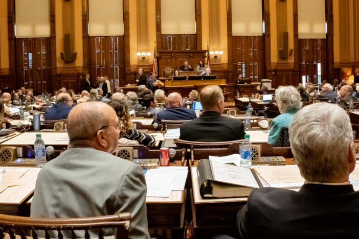 Lawmakers sit in the House chamber at the Georgia state Capitol on March 15, 2022.