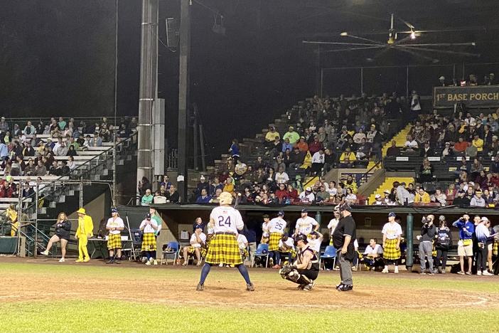 Bananas designated hitter Dakota McFadden awaits his next pitch, carefully: under the rules of Banana Ball, a batter is automatically out if he steps outside the batter's box.