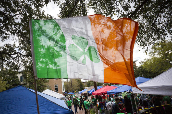 Revelers prepare for the 195-year-old St. Patrick's Day parade on one of the city's historic squares, Saturday, March 16, 2019, in Savannah, Ga. Savannah is gearing up for a big comeback of its most profitable holiday Thursday, March 17, 2022, as its beloved St. Patrick's Day parade returns for the first time since 2019.