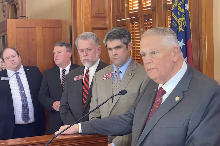 David Ralston speaks March 1, 2022, as other House representatives look on