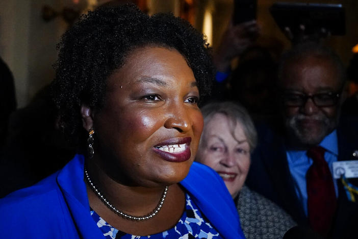 Georgia gubernatorial Democratic candidate Stacey Abrams talks to the media after qualifying for the 2022 election on Tuesday, March 8, 2022, in Atlanta. Abrams has become a millionaire. A disclosure filed in March shows the candidate for governor is worth $3.17 million, thanks mostly to book and speaking income. Abrams was worth $109,000 in 2018 when she first ran for governor.