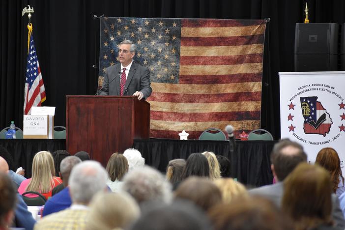 Republican Secretary of State Brad Raffensperger speaks at the Georgia Association of Voter Registration and Elections Officials conference in Athens, Georgia.