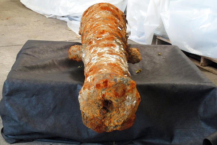 A cannon encrusted in rust and mud sits inside a warehouse operated by the Army Corps of Engineers in Savannah, Ga., on Thursday, April 28, 2022. It’s one of 19 cannons discovered in the Savannah River since last year that experts believe date to the American Revolution, when British ships were scuttled in the river to block colonists’ allies from reaching Savannah by ship.